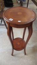 An inlaid Edwardian two tier plant stand, 35cm diameter x 95cm tall
