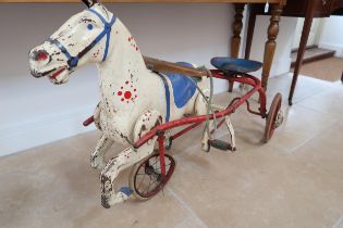 A 20th Century Metal tramp horse and wagon 100 cm x 50 cm wide x 65 cm high