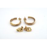 A pair of 9ct yellow gold hoop earrings - approx weight 12.3 grams - and a pair of 18ct gold