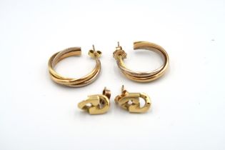 A pair of 9ct yellow gold hoop earrings - approx weight 12.3 grams - and a pair of 18ct gold