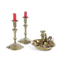 A REGENCY BRASS CHAMBER CANDLESTICK EARLY 19TH CENTURY the ejector candlestick in an oval stand,