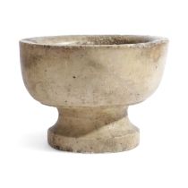 A MEDIEVAL MARBLE FONT 13TH / 14TH CENTURY the rounded body on a short stem and circular foot 26.5cm