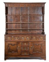 A WILLIAM AND MARY OAK DRESSER LATE 17TH CENTURY AND LATER the plate rack with applied mouldings and