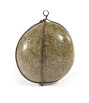 A BEZOAR STYLE STONE of irregular ovoid form in a wirework mount 9.5 x 9cm