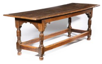 A CHARLES II OAK REFECTORY TABLE LATE 17TH CENTURY AND LATER the boarded top with cleated ends above