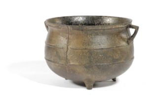 AN IRON CAULDRON 18TH / 19TH CENTURY inscribed '3/4 GALL', with a flared rim, two angular handles