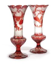 A PAIR OF BOHEMIAN GLASS VASES LATE 19TH / EARLY 20TH CENTURY ruby-flashed and engraved with stags