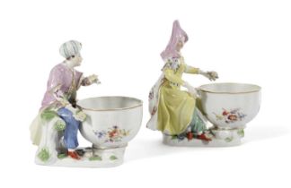A PAIR OF CONTINENTAL PORCELAIN SWEETMEAT FIGURES AFTER MEISSEN, 19TH CENTURY modelled as a Turk and