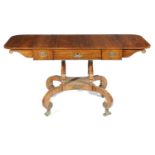λ A REGENCY ROSEWOOD AND BRASS MOUNTED SOFA TABLE EARLY 19TH CENTURY with classical mounts and