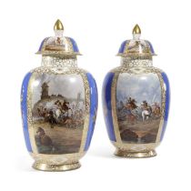 A LARGE PAIR OF DRESDEN PORCELAIN VASES AND COVER C.1900 painted with battle scenes alternating with