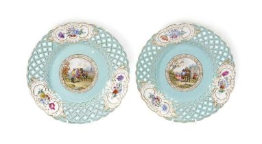 A PAIR OF MEISSEN STYLE PORCELAIN PLATES POSSIBLY VOLKSTEDT, 19TH CENTURY painted with figural