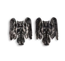 A pair of Art Nouveau silver cuffs, early 20th century, each designed as an owl in flight, inner