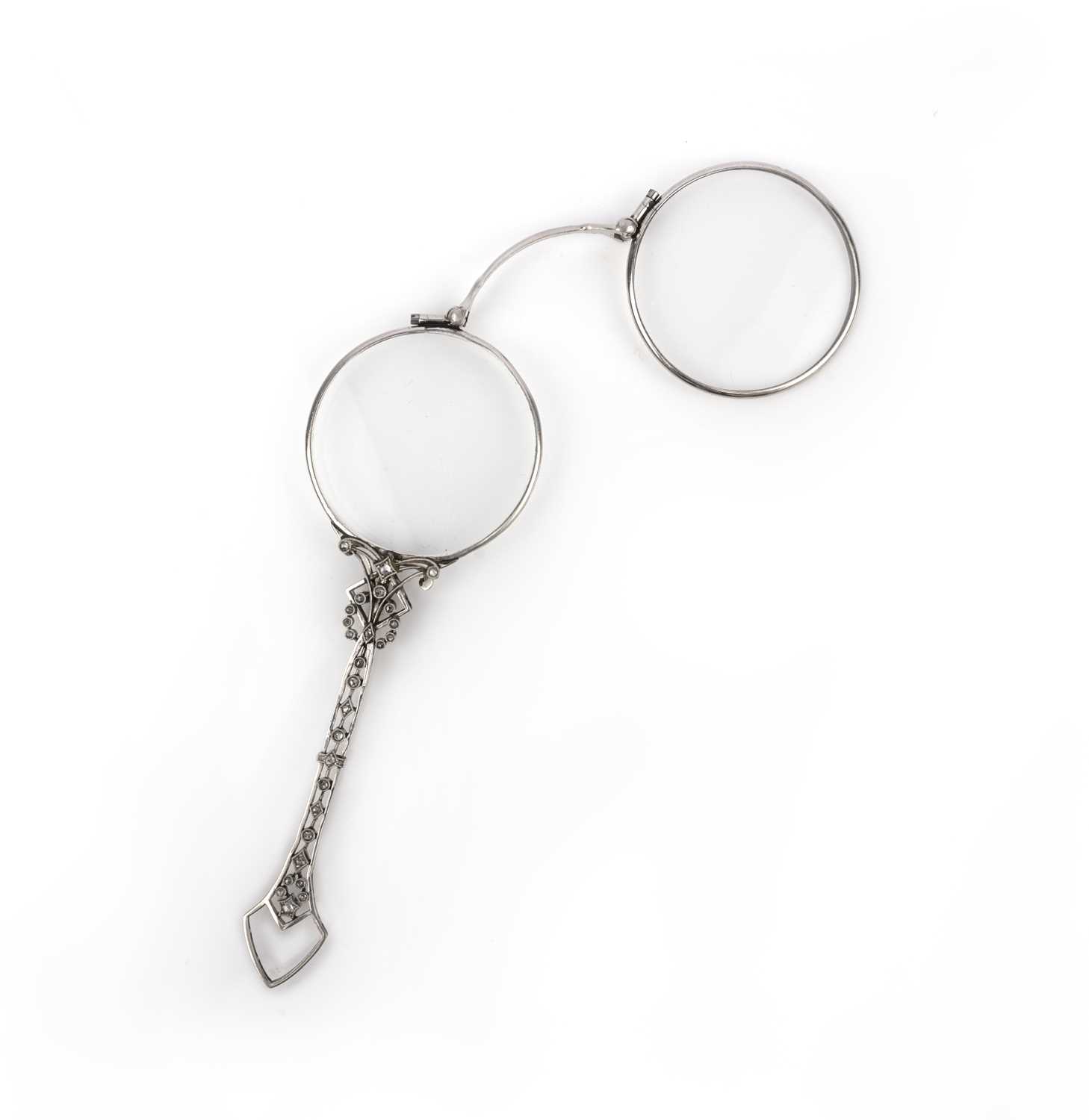 A diamond lorgnette, early 20th century, designed as a spring-loaded pair of circular eyeglasses, - Image 2 of 2