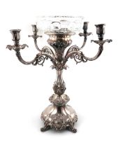 An early 19th century old Sheffield-plated four-branch candelabrum centrepiece, unmarked circa 1830,