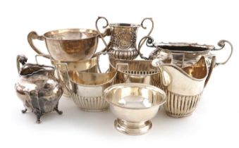 A mixed lot of silver items, various dates and makers, comprising: a cream jug and sugar bowl,