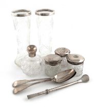 A mixed lot of silver items, comprising: a pair of silver-mounted glass vases, London 1922, a