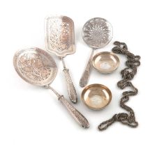 A mixed lot of metalware items, comprising: three Persian rice servers, the blade/bowls with pierced