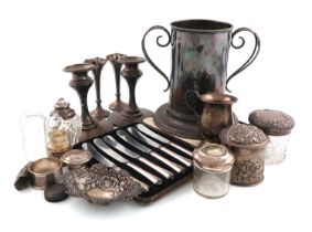 A mixed lot of silver items, comprising: a pair of candlesticks, Birmingham 1901, a mug, a pair of