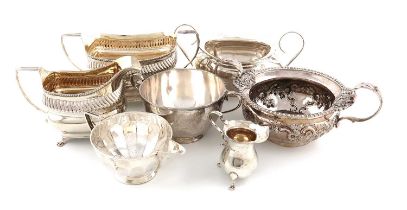 A mixed lot of silver items, comprising: a George III cream jug and sugar bowl, by Peter and William
