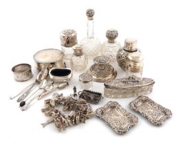 A mixed lot of silver items, comprising: an Art Nouveau German silver-mounted scent bottle, the