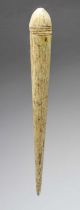 A whalebone fid early 19th century with incised lines to the top and tip, 31cm long.