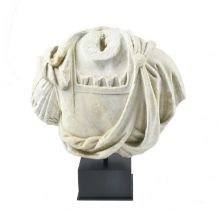 A Roman marble cuirassed bust circa 1st / 2nd century AD wearing a cuirass over a tunic, the
