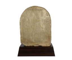 An Egyptian limestone stele New Kingdom, Ramesside Period, circa 1292 - 1069 BC carved the falcon