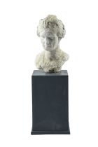 A Roman marble female portrait bust circa 1st century AD with waved braided hair, 39cm high, on a