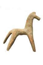 A Boeotian terracotta horse circa 6th century BC part of the front leg left missing and with painted