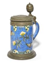 A large German faïence pewter-mounted tankard or stein, late 18th century, painted in polychrome