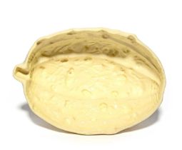 A Wedgwood creamware jelly mould, late 18th century, modelled as a melon or large gourd, the