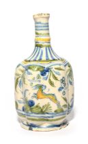 An Alcora faïence bottle, c.1730, of hexafoil form, painted in blue, green, ochre and yellow with