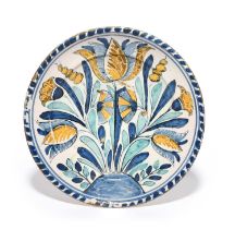 A delftware blue dash tulip charger, c.1690-1700, probably Bristol or Brislington, painted in