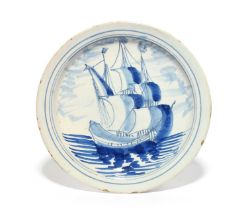 A rare delftware shipping plate, early 18th century, probably Bristol, painted in blue with a