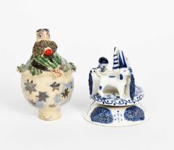 Hylton Nel (born 1941) an earthenware solifleur vase, modelled as stylised figure, glazed in colours