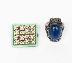 A Bernard Instone silver and enamel brooch, pierced, square section enamelled with small white