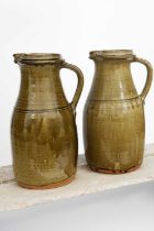 Richard Batterham (1936-2021) a pair of large stoneware jugs, covered to the foot in an ash glaze