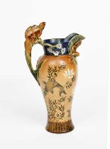 A Doulton Lambeth Japoniste stoneware jug in the manner of George Tinworth, shouldered form, the