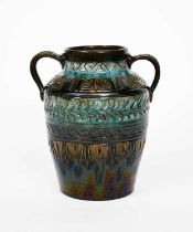 A Linthorpe Pottery vase designed by Dr Christopher Dresser, shouldered, twin-handled form,