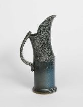 Φ Walter Keeler (born 1942) a salt-glaze stoneware Articulated tall jug with strap handle, blue
