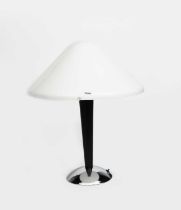 An iGuzzini table lamp designed by Harvey Guzzini, chrome base with ebonised woodstem and white