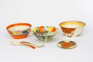 'Melon' a Clarice Cliff Fantasque Bizarre bowl, painted in colours between orange bands, a Clarice