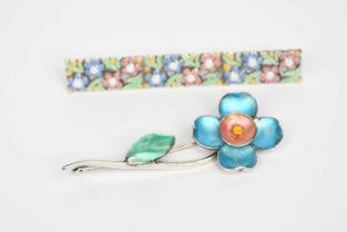 A Bernard Instone silver and enamel flower brooch, enamelled in colours, and a Bernard Instone