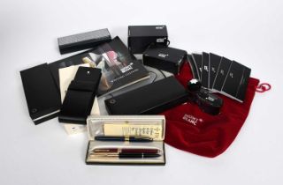 A collection of Mont Blanc writing accessories, comprising leather three pen travelling pouch, red