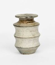 Φ Geoffrey Eastop (1921-2014) a stoneware vase, ribbed cylindrical form covered with a mottled