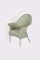 A William Lusty Lloyd Loom armchair, sprayed mint green, another armchair and side table sprayed