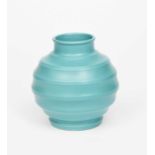 A Wedgwood Pottery vase designed by Keith Murray, ribbed, ovoid form with collar rim, covered in a