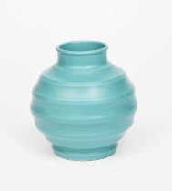 A Wedgwood Pottery vase designed by Keith Murray, ribbed, ovoid form with collar rim, covered in a