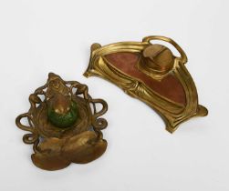 An Art Nouveau cast brass inkwell with Austrian iridescent glass well, in the manner of Gurschner,