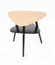A teak veneer side table, triangular top over offset ebonised shelf, on three flaring legs,